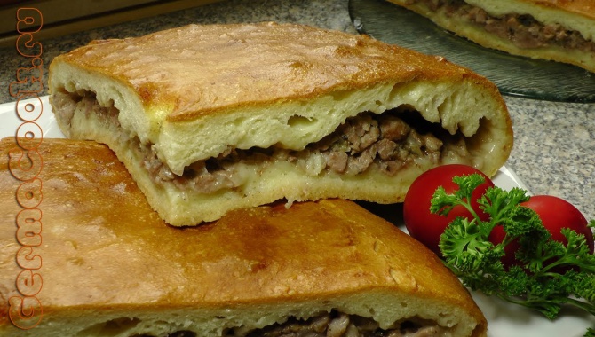 Пирог на кислом тесте с начинкой из свиного мяса - видео рецепт